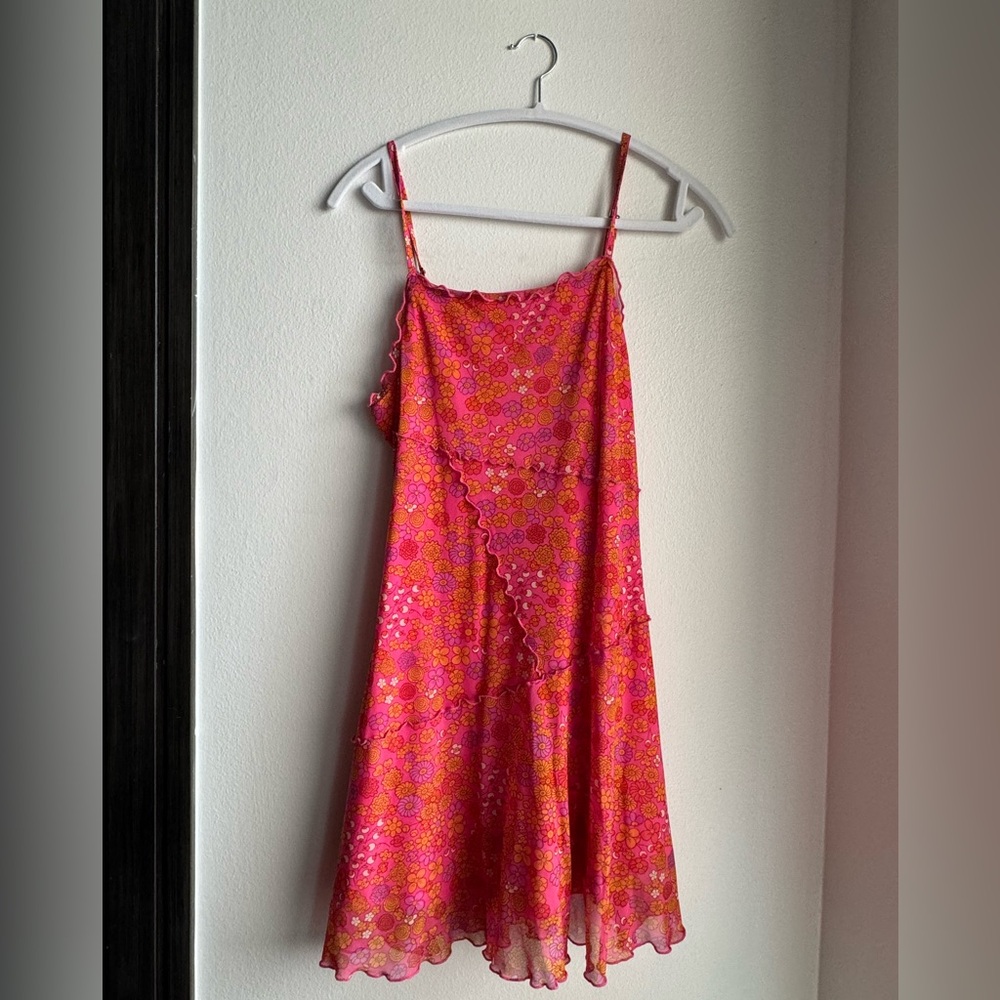 hot pink dress with colegio flower details and ruffles